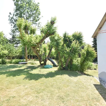 Апартаменты Plush With Garden In *